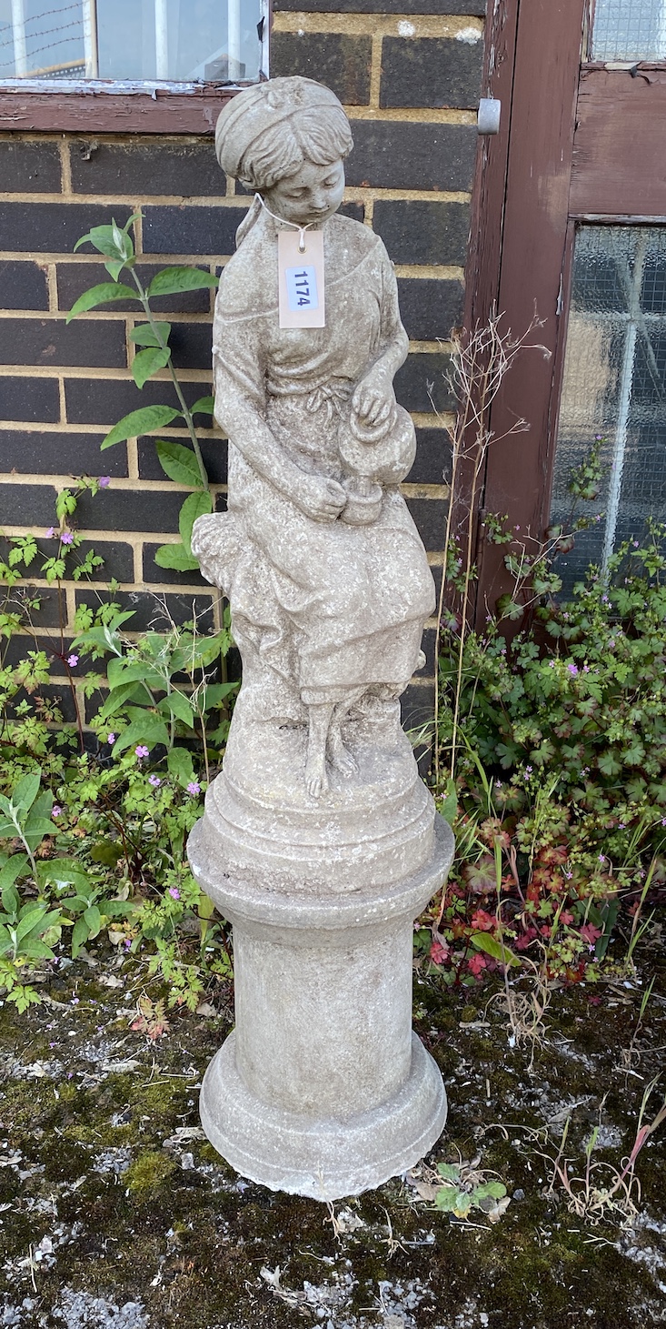 A reconstituted stone garden statue of a water girl, height 94cm